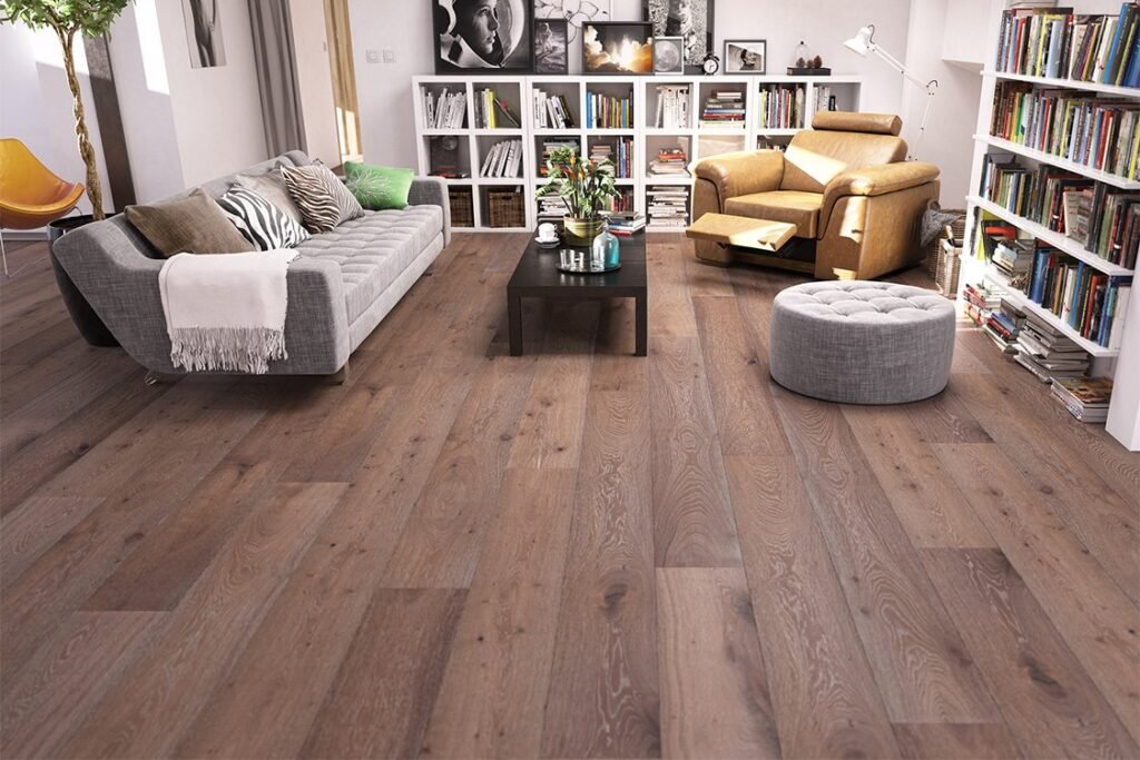 Light oak engineered hardwood flooring in a bright living room with a fireplace and golden retriever