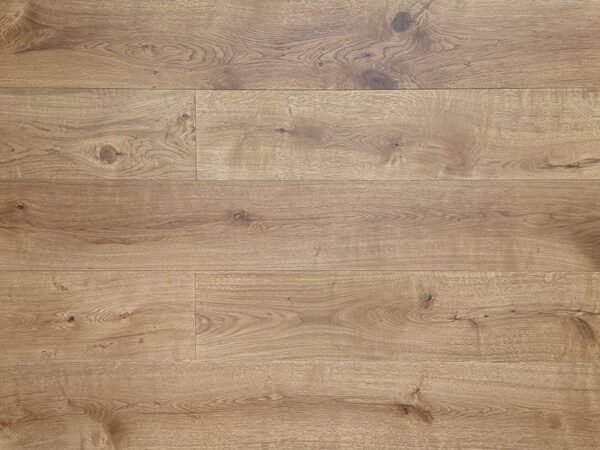 Auburn engineered hardwood flooring with warm brown tones, visible knots, and varied oak grain